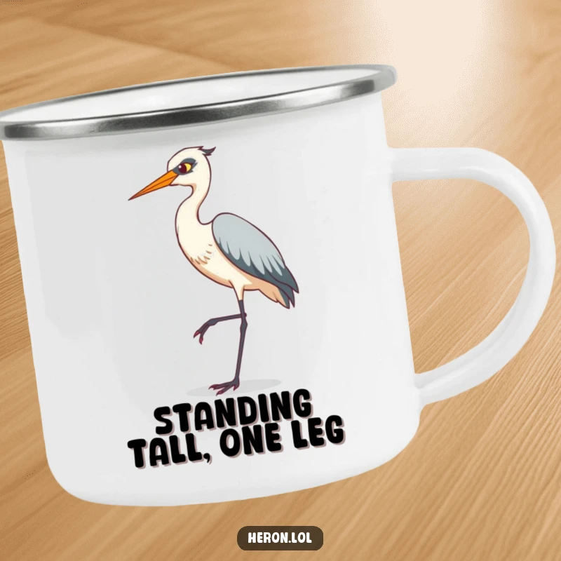 Funny camping mug featuring a heron in a comical tiptoeing pose on a single leg, durable and humorous for outdoor enthusiasts.