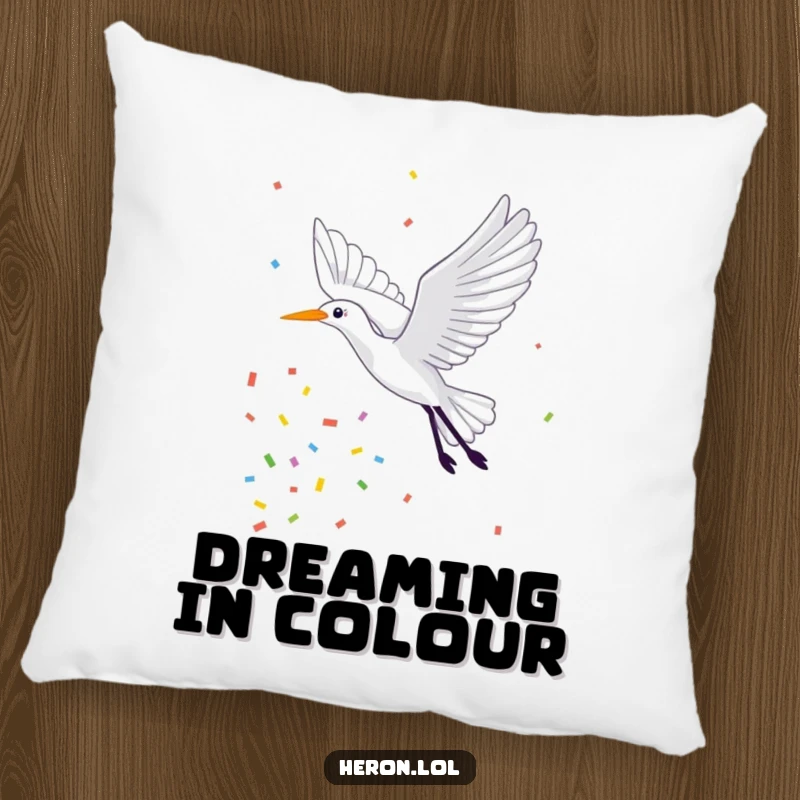 Funny Pillow showcasing a cheerful heron in flight, leaving a beautiful and colorful trail of confetti, offering cozy comfort and festive vibes.