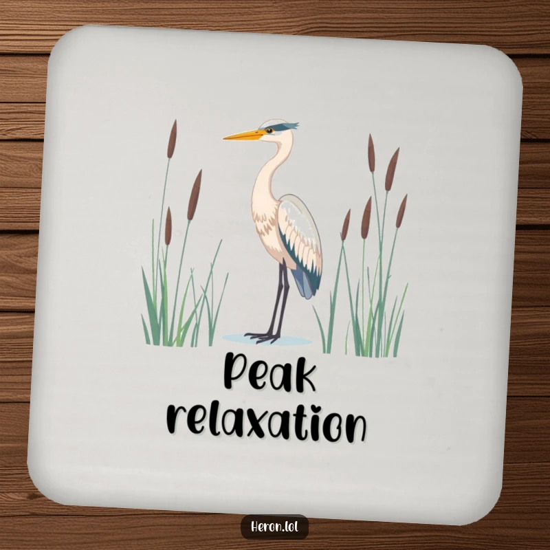 Serene heron bird drink coaster, majestic and standing tall amidst reeds, offering stylish table protection.