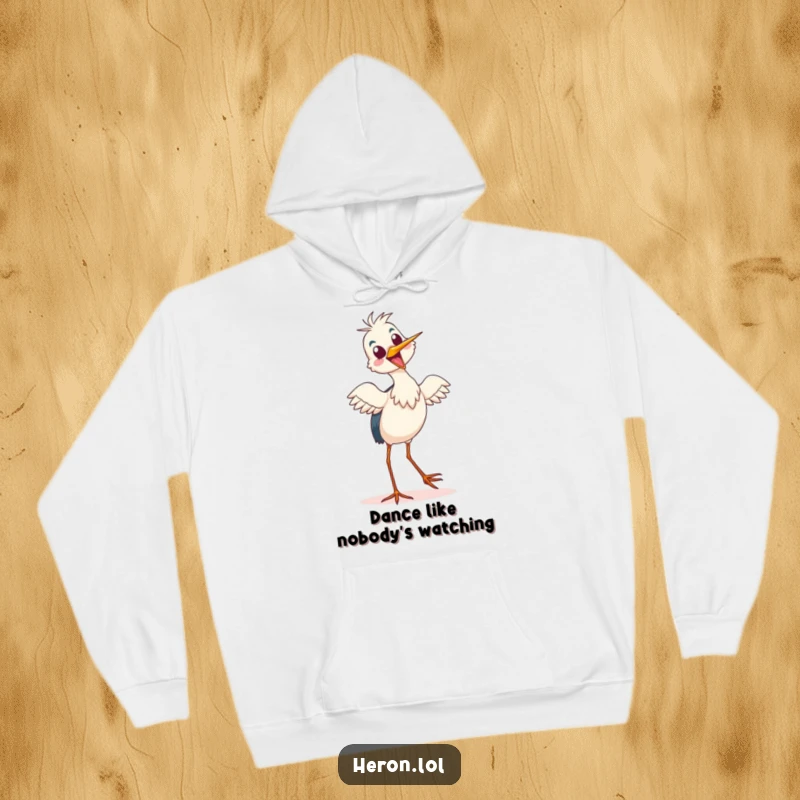 Funny Hoodie depicting a delighted heron doing a silly tiptoe dance, offering comfort and infectious good cheer.