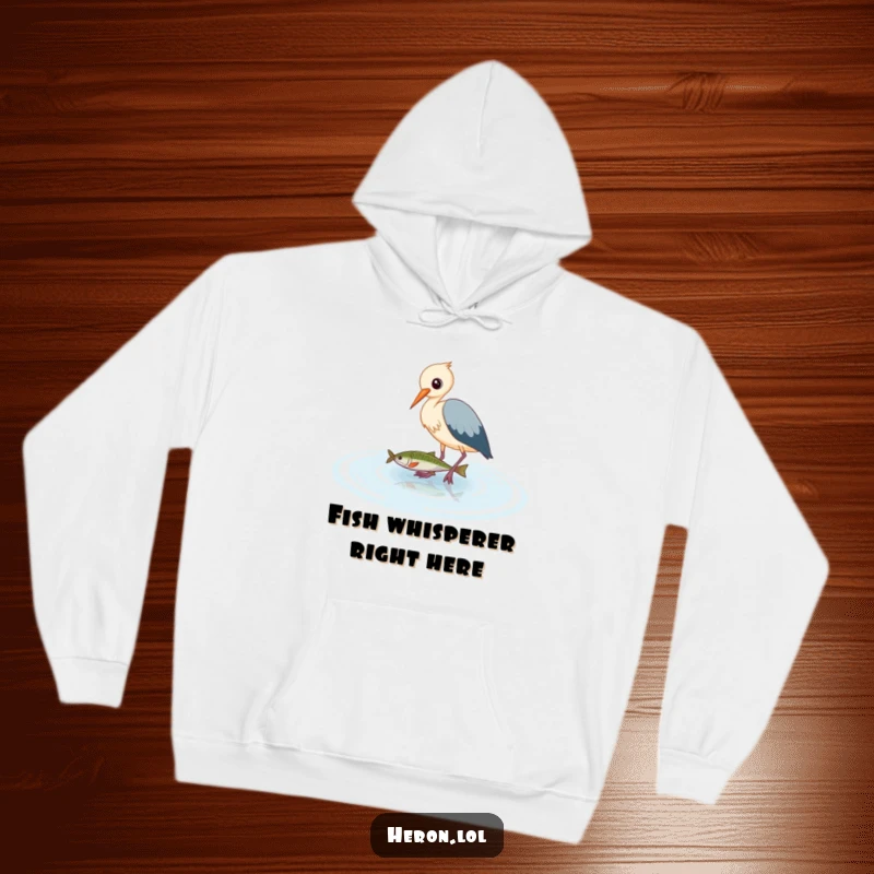 Funny Heron Hoodie: Cute bird wading in shallow water with a fish, exuding charm and a playful, humorous fishing spirit.