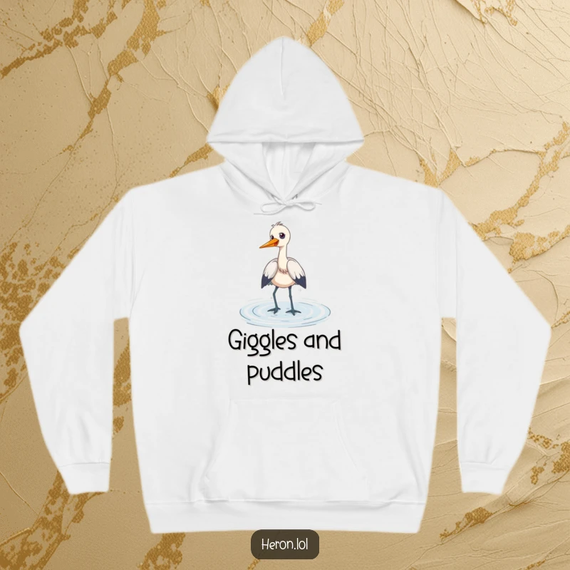 Funny Hoodie with a heron wading through shallow water, its face alight with a playful giggle, representing cheerful wading and humorous delight.