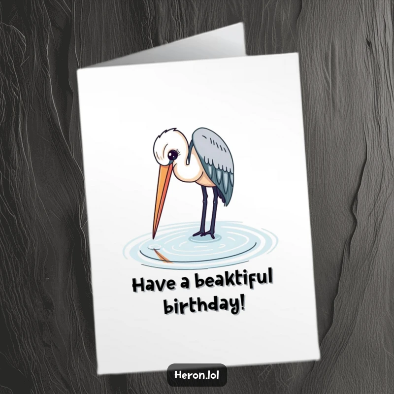 Elegant Free Printable Birthday Card: A heron with a long beak gracefully dips its beak into calm water for a peaceful birthday wish.