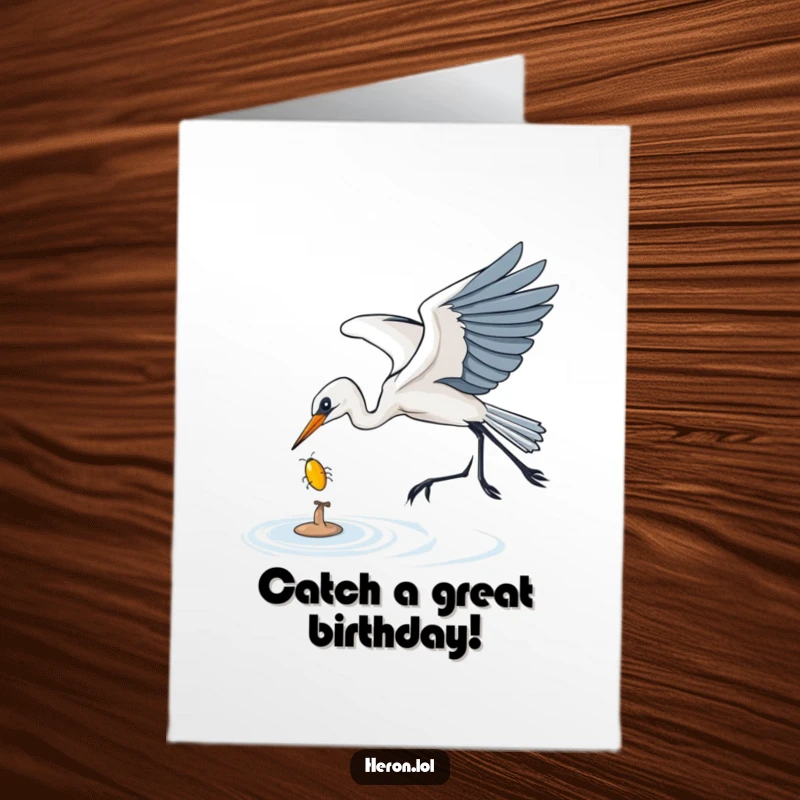 Funny Free Printable Birthday Card: Heron gracefully swoops from the sky to snag a shiny bug, celebrating the day.