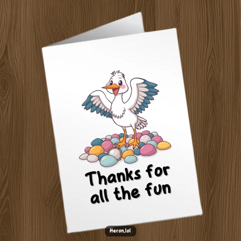 Funny Free Printable Thank You Card: A joyful heron bird flapping its wings happily near colorful pebbles.
