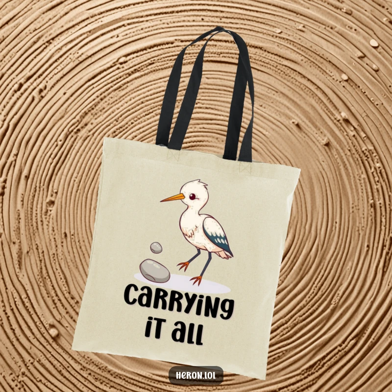 Funny heron bird attempting to juggle three shiny pebbles with its feet, a humorous tote bag showcasing avian talent.