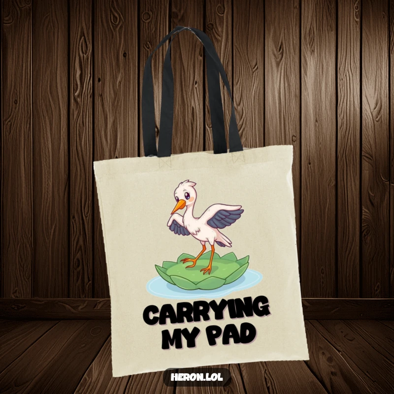 Funny Heron Tote Bag: A delighted bird gracefully lands on a lily pad, perfect for carrying items with natural charm.