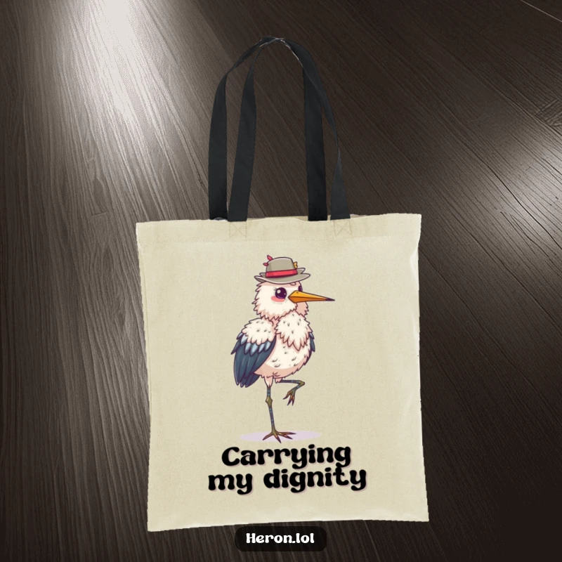 Funny fluffy heron tote bag, standing on one leg, balancing a hat, sturdy and stylish, ideal for carrying items with elegance, a fun gift.
